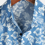 Blauw aloha-herenoverhemd met tropische bloemen