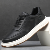 Minimalistische leren herensneakers