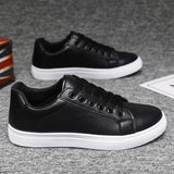 Elegante leren herensneakers in ingetogen stijl